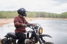 Rider Sits On A Motorcycle Near A Quarry