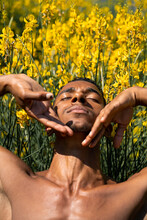 Portrait Of Male Dancer Moving In Nature 