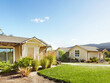 © Trinette Reed/Stocksy - Tiny home cottages at luxury resort