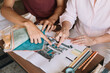 © Alberto Bogo/Stocksy - Fashion Designers Decinding On Textile Swatches