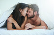 © AS/peopleimages.com - I am more in love with you than ever. Shot of a young couple having an intimate moment under the covers.