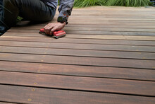 Spotted Gum Timber Deck Being Sanded