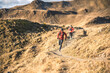 © plpictures by Paedii Luchs/Stocksy - Trail runners on a wild path in the alps.