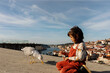 © Valentina Barreto/Stocksy - Kid feeding seagull in Oporto