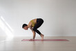 © Javier Pardina/Stocksy - Advanced Yoga