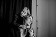 © Anna Artemenko/Stocksy - portrait of woman and little girl