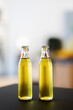 © Studio Marmellata/Stocksy - Glass wet bottles of lemonade on table