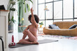 © Malquerida Studio/Stocksy - fitness instructor doing stretching exercises