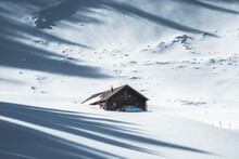 Wooden House In Winter