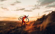 Mountain Biker At Sunset