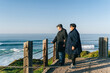 © Daniel Gonzalez/Stocksy - Elderly couple standing on embankment