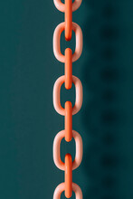 Top-down View Of Pink Chains On Deep Blue Background