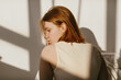 © Sergey Filimonov/Stocksy - Woman Portrait Sunlight