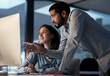 © Nicholas Felix/peopleimages.com - Business moves on when staff gets along. Shot of a young man helping his colleague in a call centre late at night.