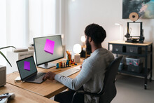 Bearded Man Creating Draft Of 3D Figure On Devices