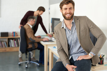 Poster - Confident about my creative team. Portrait of a smiling businessman in a modern office.