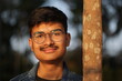 © Dream Lover/Stocksy - Indian teenage boy portrait looking at camera at outdoors at evening