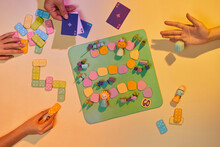 Man Playing A Board Game. The Dice At The Time Of The Roll.
