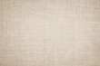 Jute hessian sackcloth burlap canvas woven texture background pattern in light beige cream brown color design element.