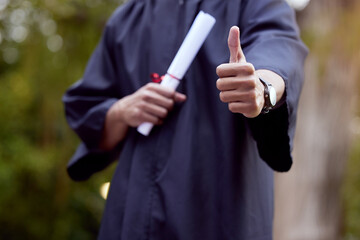 Poster - Stay dedicated and great things will happen. Cropped shot of a young man showing thumbs up on his graduation day.