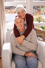 Sticker - An inseparable pair. A portrait of a happy mature couple spending time together at home.