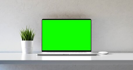 Wall Mural - laptop with a blank screen in the minimalist white room - green screen, includes luma matte to mask 