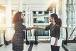 © D Donson/peopleimages.com - Its been great working with you. Shot of two attractive businesswomen shaking hands in the workplace.