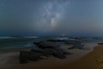 Wall Mural - beautiful milky way over turimetta beach coastline, sydney, australia.