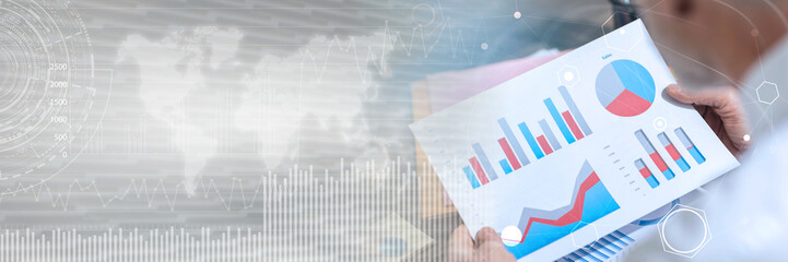 Businessman analyzing financial data, double exposure, light effect; panoramic banner