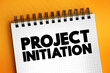 Project initiation - first step in starting a new project, text concept on notepad for presentations and reports