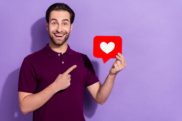 Canvas Print - Photo of impressed millennial brunet guy show like wear purple polo isolated on violet color background