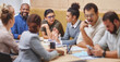 © Delcio Fernandes/peopleimages.com - Around the boardroom table. Cropped shot of a large group of corporate businesspeople sitting around a table in the boardroom during a meeting.