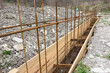 Reinforcement of the strip foundation with metal reinforcement, the top row of reinforcement is in focus