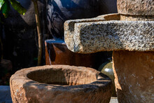 Close-up Of Traditional Stone Mill In A Chinese Garden