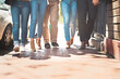 © Camerene P/peopleimages.com - Lets take a stroll down the street guys. Low angle shot of a group of unrecognizable people walking together down a street outside during the day.