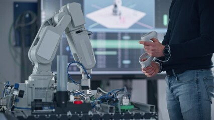 Poster - Unrecognisable Male Student Holding Virtual Reality Controllers, Uses New Technology for Industrial Design, Development, Prototyping in Robotics. High Tech Concept