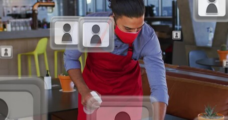 Poster - Profile icons floating against african american male waiter wearing face mask cleaning the table