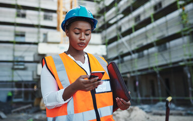 Poster - Forget the desk, use your phone. Shot of a young woman using a smartphone while working at a construction site.