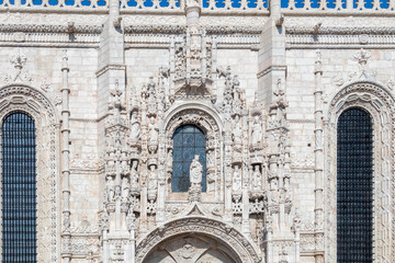 Wall Mural - Detail closeup of the facade of the Manueline ornamentation in the cloisters of Jerónimos Monaster in Belem, Lisbon, Portugal