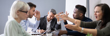 Business People Arguing In Meeting