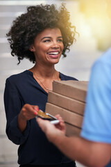 Poster - Delicious, hot pizza is just a payment away. Shot of a happy businesswoman accepting a pizza delivery from an unidentifiable delivery man in the office.