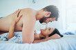 © AS/peopleimages.com - All of me loves all of you. Shot of a young couple sharing an intimate moment in their bedroom.
