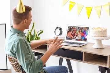 Sticker - Young man celebrating Birthday online at home due to Coronavirus epidemic