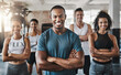 © Delmaine Donson/peopleimages.com - Were here for the fitness. Portrait of a group of confident young people working out together in a gym.