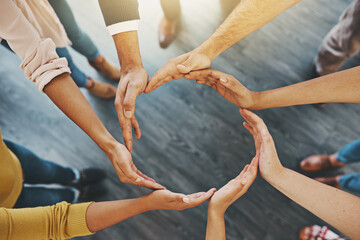 Poster - Were all in it to make a success. High angle shot of a group of unidentifiable businesspeople forming a circle with their hands.