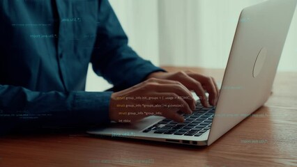 Computer programmer uses capable laptop computer to develop programming code of new software . Computer specialist working on future coding application for software programming development .