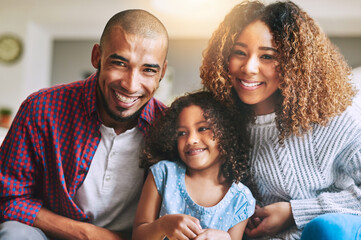 Aufkleber - Family time, enjoy every minute of it. Portrait of a happy young family of three spending quality time together at home.
