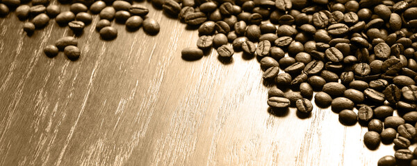 Wall Mural - Coffee grains on a wooden table