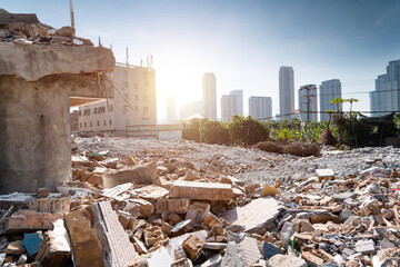 Contrast of demolished old house and modern skyscraper