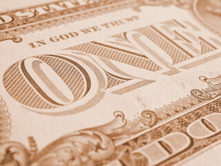 Wall Mural - american paper money. 1 us dollar bill. word one close-up. light brown tinted background or wallpape
